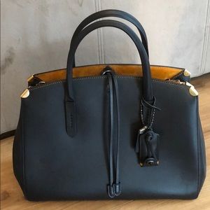 coach cooper carryall with rivets